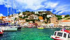 View of port with colourful boats on Hydra island in Saronic, Greece